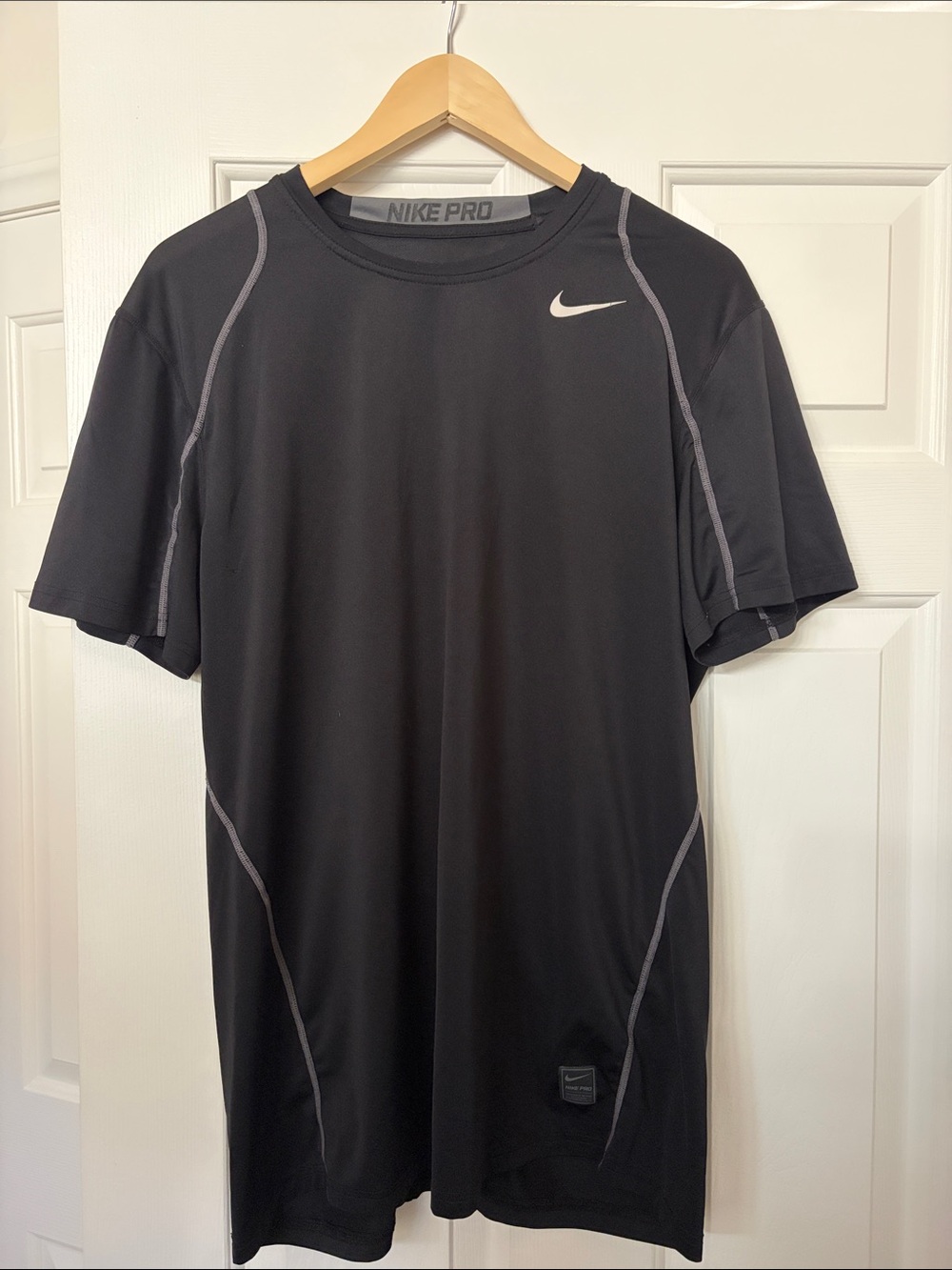 Nike Black Short-Sleeve Athletic Tee with Gray Stitching